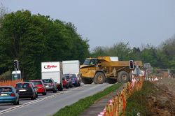 Heavy plant crossing the road