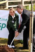 Jessica Strutt and Paul Clark plant the tree