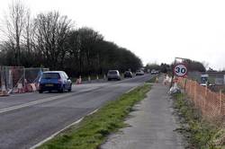 The temporary traffic lights on the hill have been removed