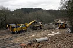 Planing machines removing the old road surface