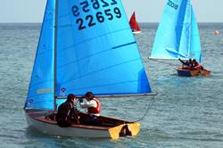 Sailing out into Looe Bay