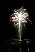 Polperro fireworks over Peak rock and the harbour