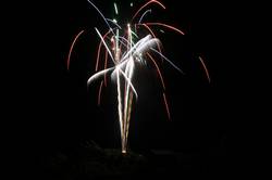 Polperro fireworks over Peak rock and the harbour