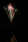 Polperro fireworks over Peak rock and the harbour