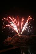 Polperro fireworks over Peak rock and the harbour