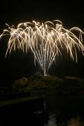 Polperro fireworks over Peak rock and the harbour